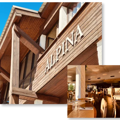Gîte de groupe Auberge Alpina à Gréolières — Façade en bois de l'Auberge Alpina avec l'enseigne, ciel bleu et charpente montagnarde, capacité 40 personnes
